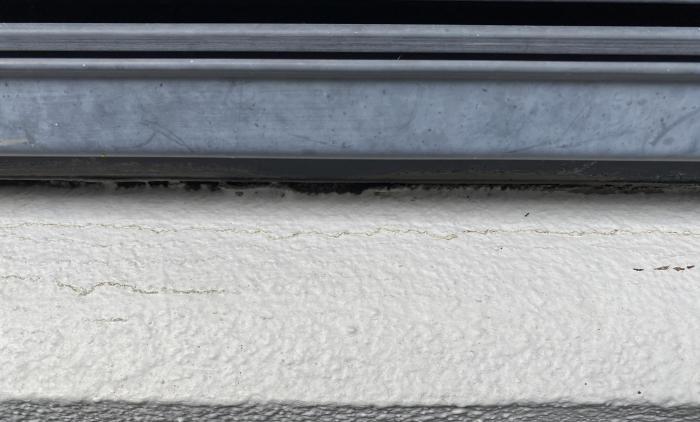 1. 2002 version buckled cracked leaking.jpg